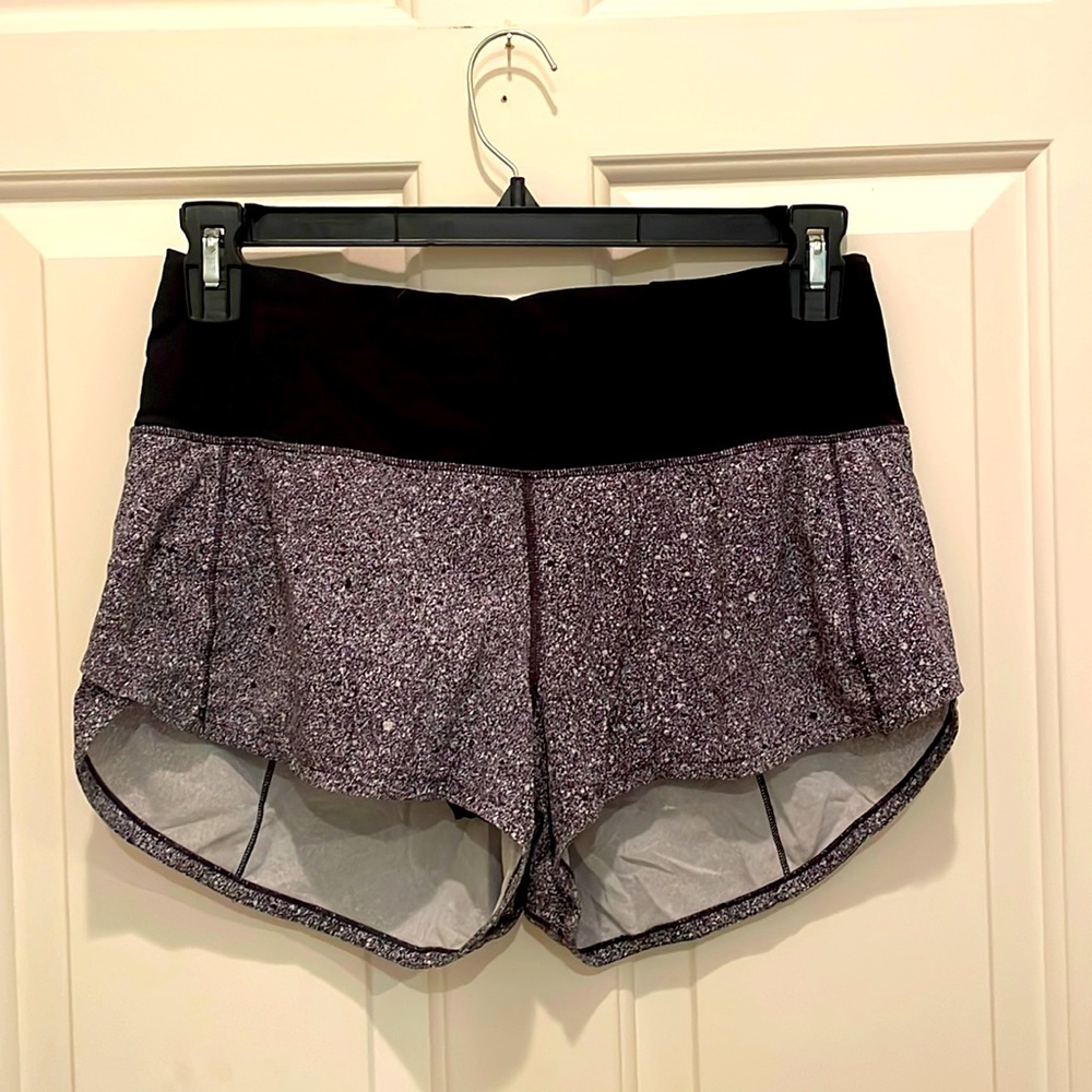 super cute and super comfy high rise speed up shorts and black with white dots!
